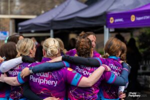 NIPANC fundraisers stand in a huddle