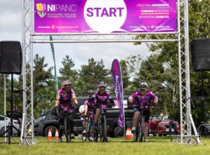 A trio of riders at the start line